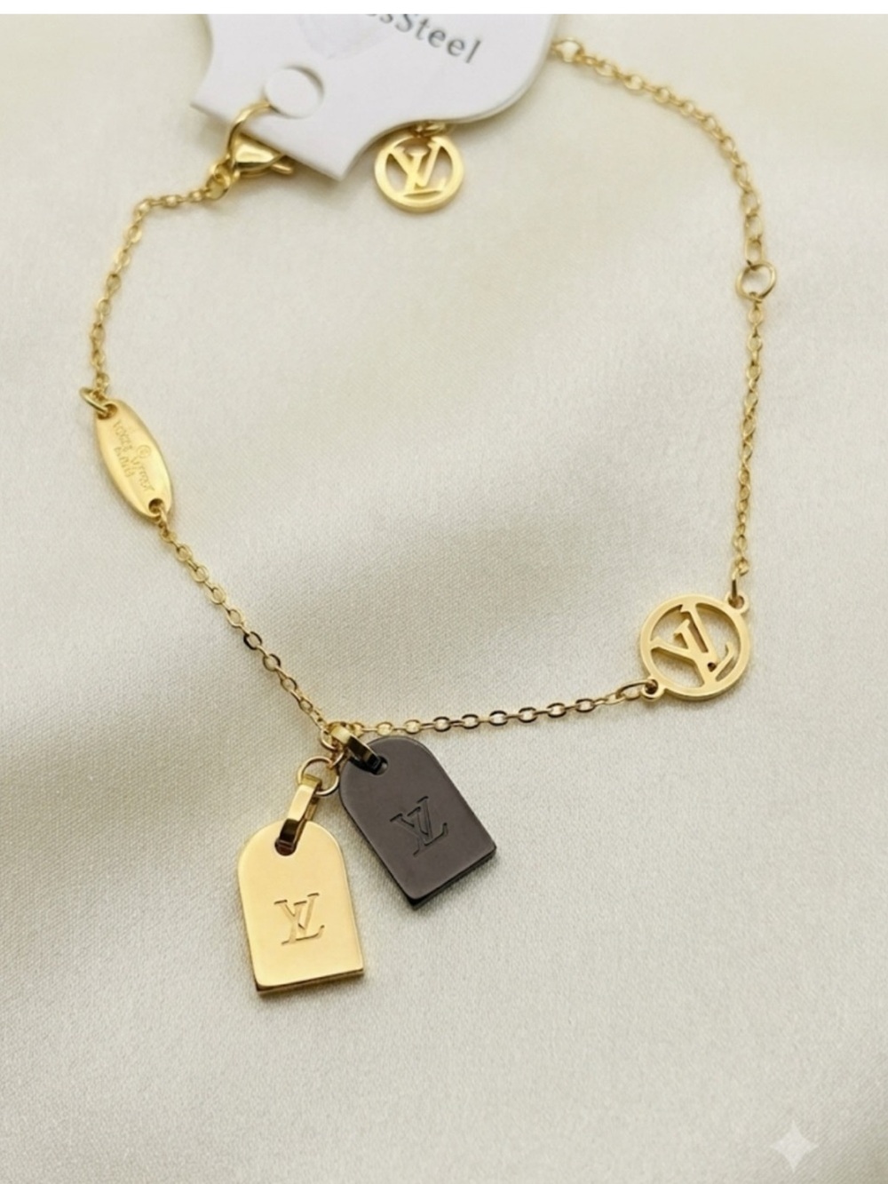 Gold-Tone bracelet with Double Tag Pendants